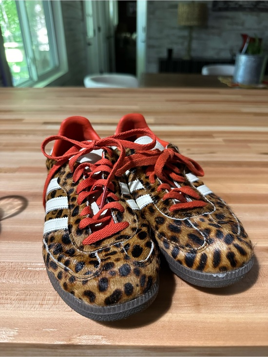 adidas Shoes - adidas womens Leopard-Print Sneakers with Red and white laces.